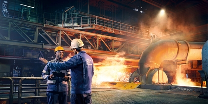 Engineer in front of a cement kiln