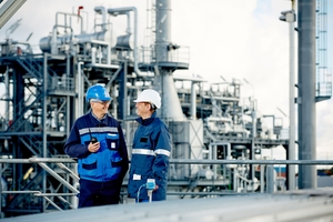 Two engineers in an oil refinery